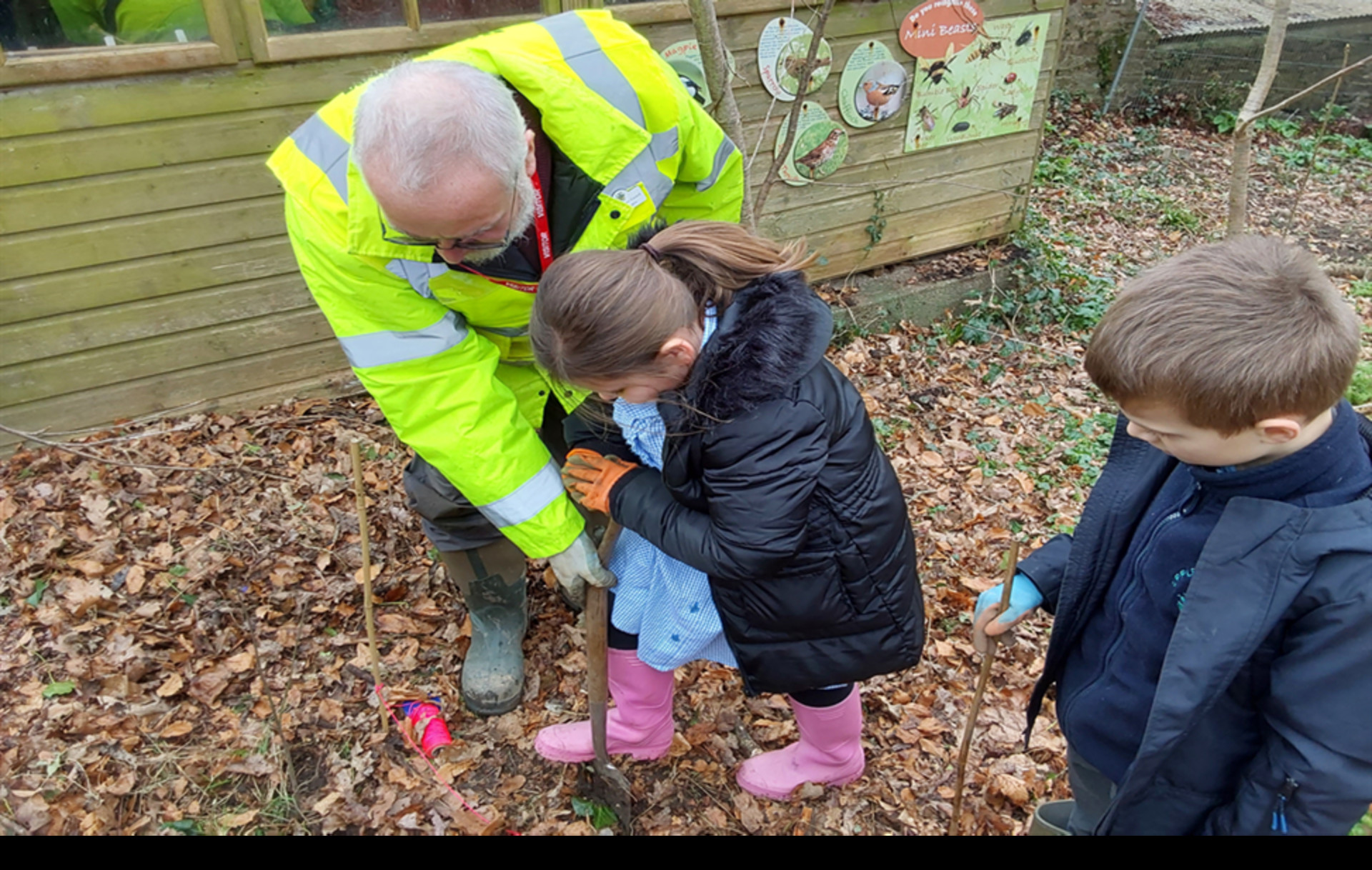 Planting hedges at the school with Northam Town Council staff and councillors